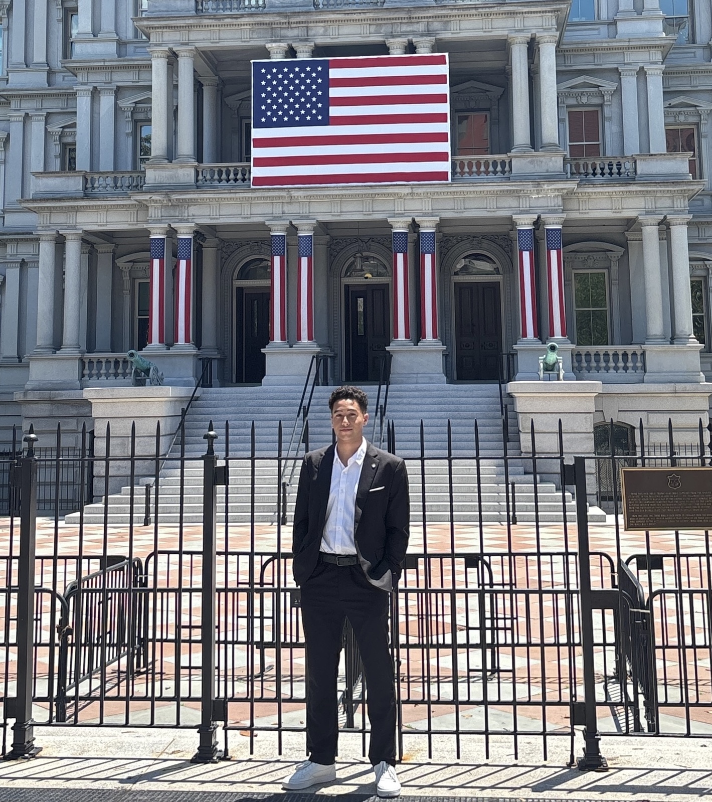 Rayane in front of government building in D.C.