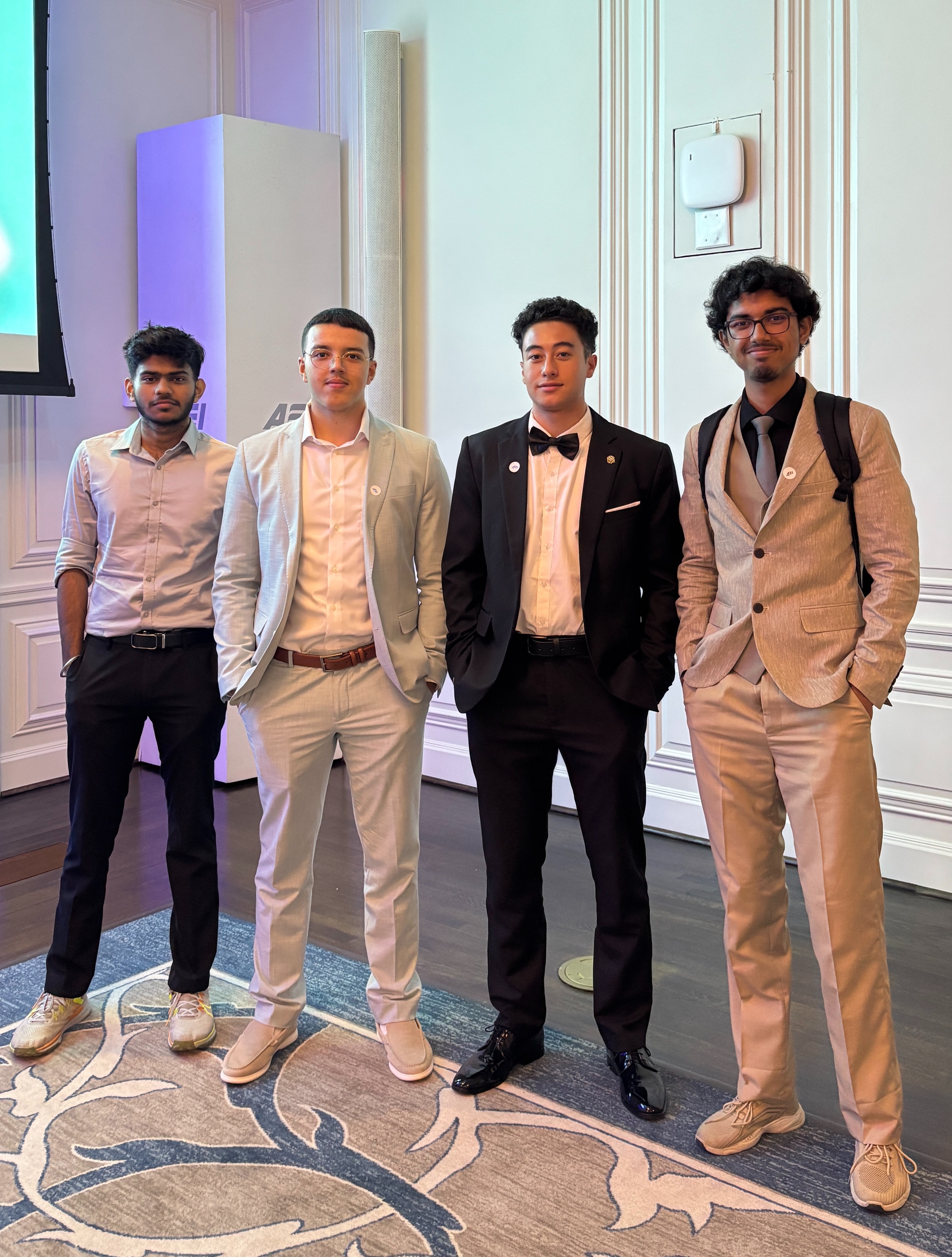 Rayane and team at Osgood Center internship conference